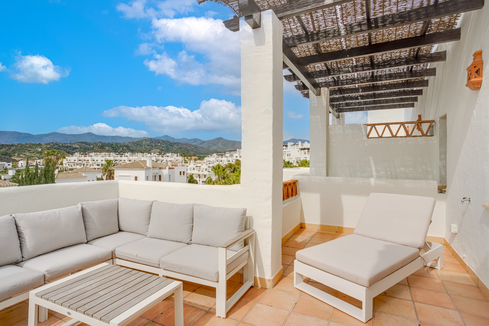 Covered terrace with view, new-build – Costa del Sol, photo by Your Property Concept