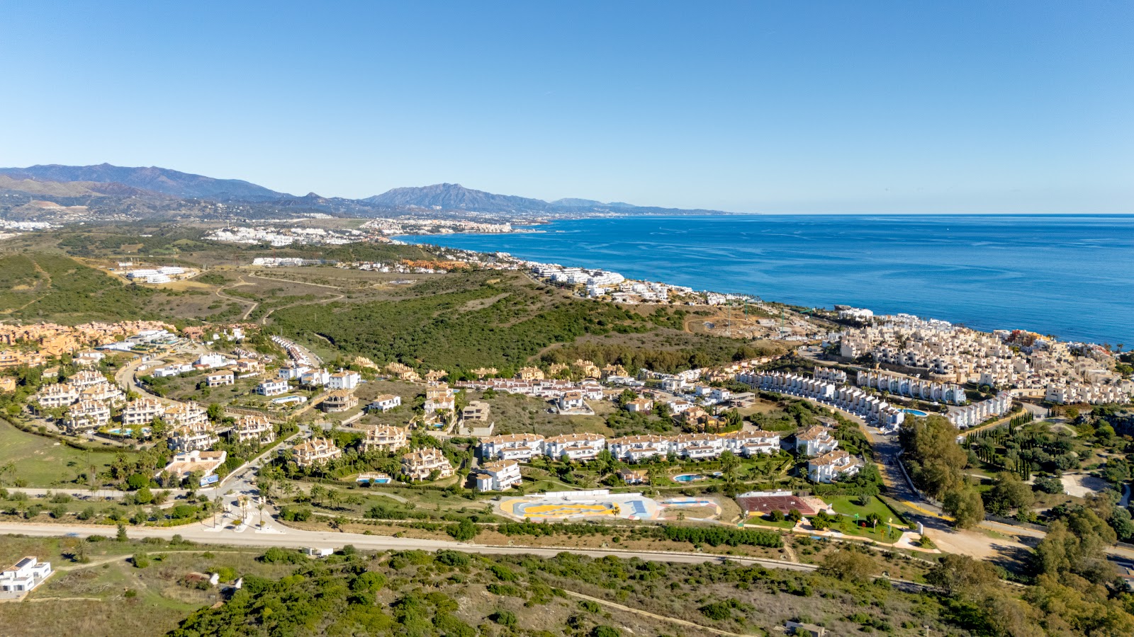 Aerial with mountains and sea – Costa del Sol, photo by Your Property Concept